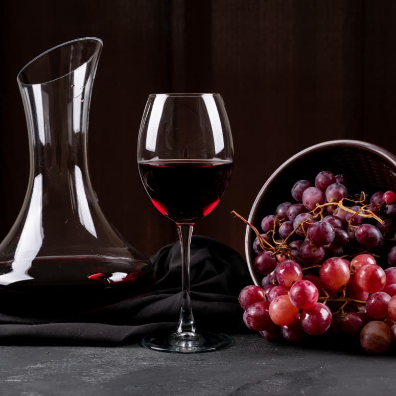 side-view-jug-with-red-wine-grape-dark-horizontal